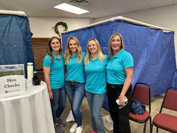 4 women standing together at Health Fair
